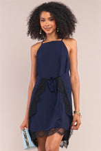 Cargar imagen en el visor de la galería, Navy Halter Neck Sleeveless Front Self-tie Lace Trim Slip Mini Dress